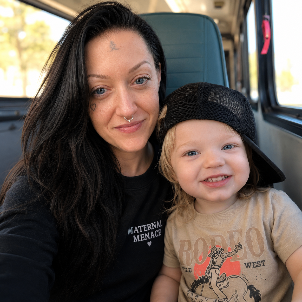 Samantha and her son on a bus adventure