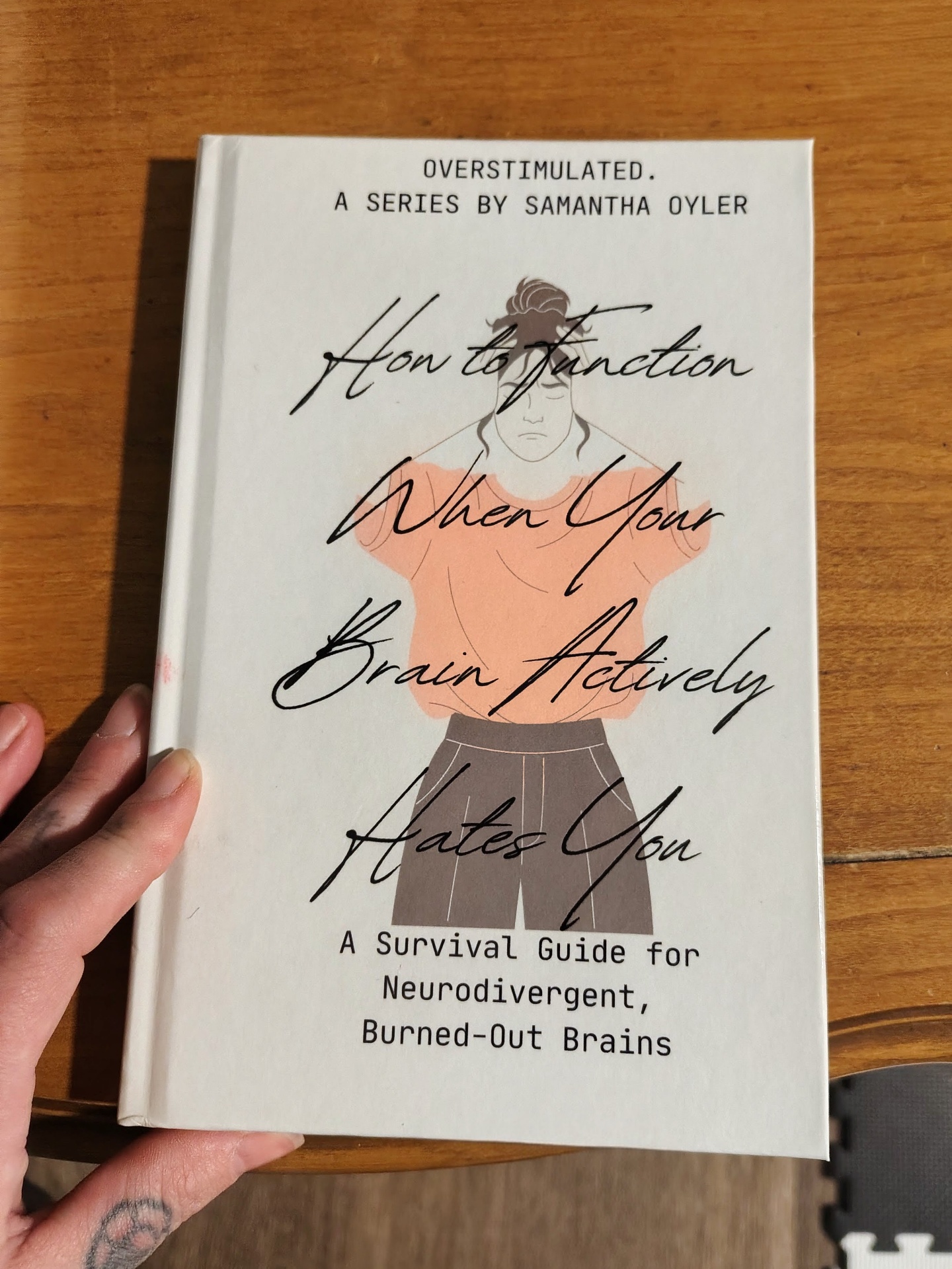 Printed copy of How to Function When Your Brain Actively Hates You by Samantha Oyler